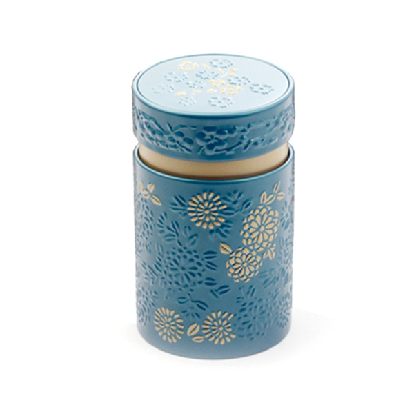 Ornate tea tin can